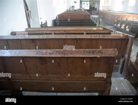 Pews for young men inside All Saints church, Laxfield, Suffolk, England, UK Stock Photo - Alamy