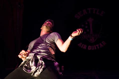 Photos Watch Out This Air Guitar Competition Might Melt Your Face