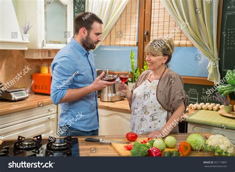 Happy Mature Woman Son Toasting Wine Stock Photo Edit Now 351113807