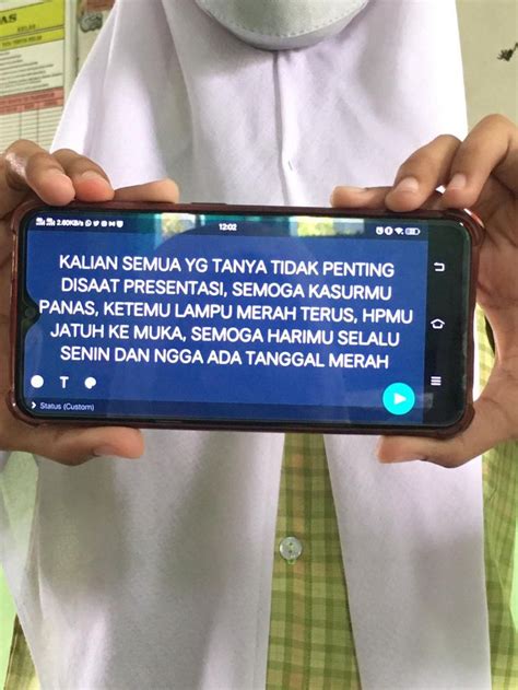 A Person Holding A Cell Phone In Their Hands With The Text On It That Reads