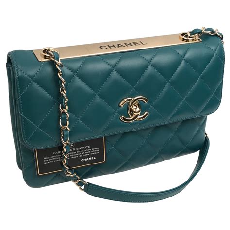 CHANEL QUILTED LAMBSKIN TRENDY CC FLAP BAG with gold hardware. Blue ...