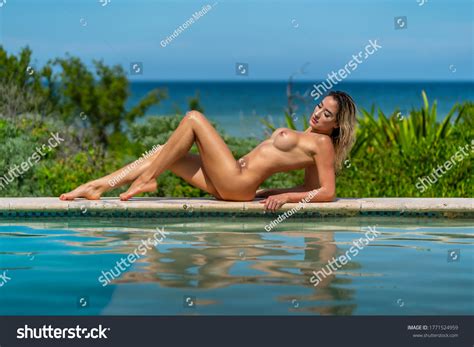Beautiful Blonde Nude Model Poses Swimming Stock Photo 1771524959 Shutterstock