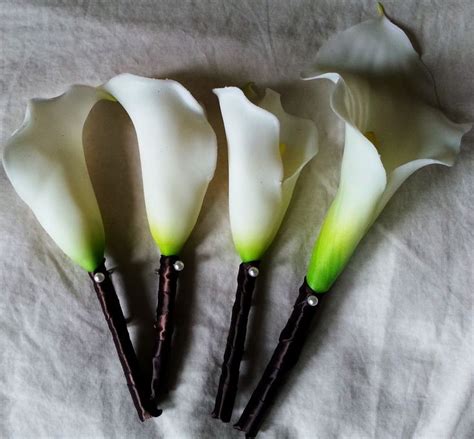 Calla Lily Boutonnieres W Brown Satin Stems And Single White Pearl