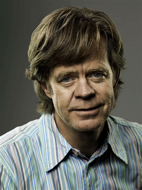 Download William H Macy Smiling At The Camera In A Stylish Outfit