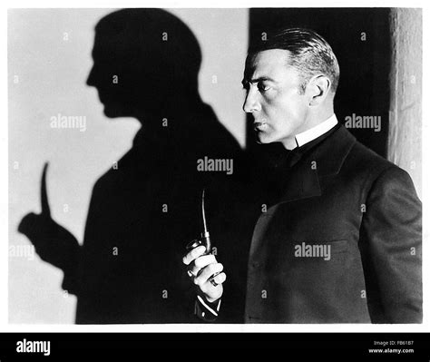 Publicity photograph showing Clive Brook in the role of Sherlock Holmes ...