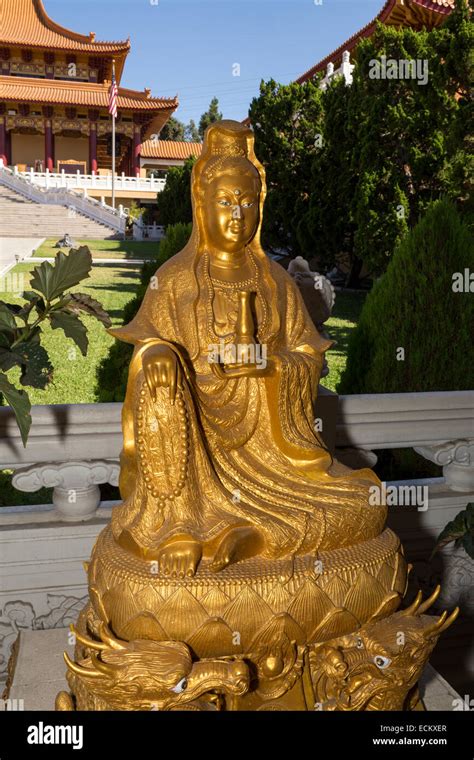 Statue Of Avalokitesvara Bodhisattva Seated On Lotus Throne Atop Two