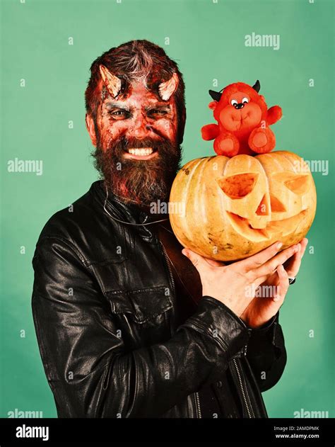 Monster with October decorations. Halloween party concept Man wearing ...