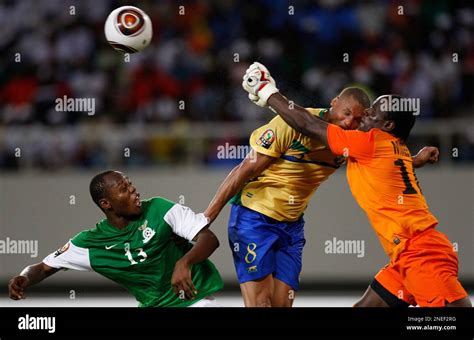 Gabon S Captain Daniel Cousin Center Collides With Zambia S