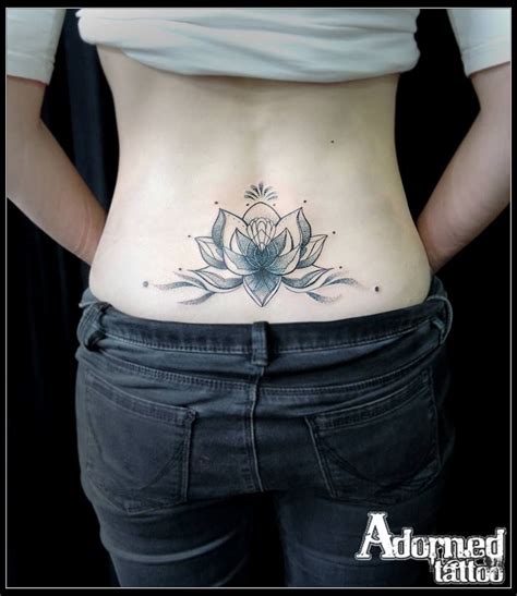 Lower back lotus flower #blackwork #dotwork #lotusflowertattoo ...