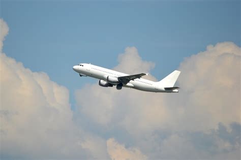 Premium Photo Flying Passenger Jet Plane Side View