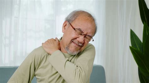 Close Up Of Sad Senior Man Neckache Hand Holding Neck Old Man