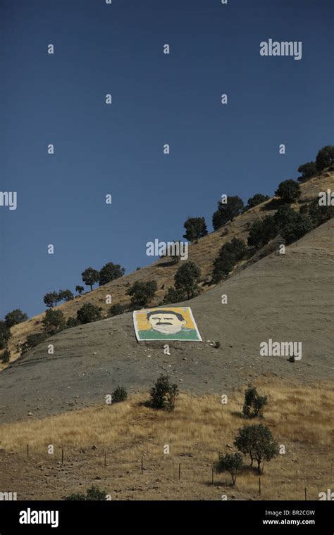 Huge figure of former PKK militant leader Abdullah Ocalan in a hillside ...