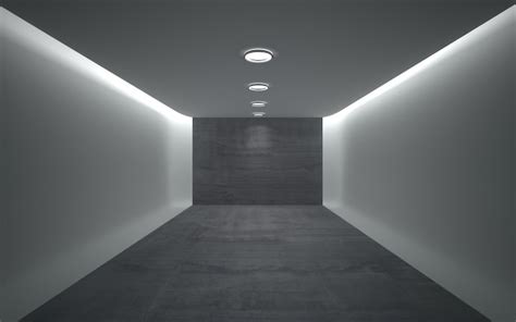 Premium Photo | A dark room with a white wall and lights on the ceiling.