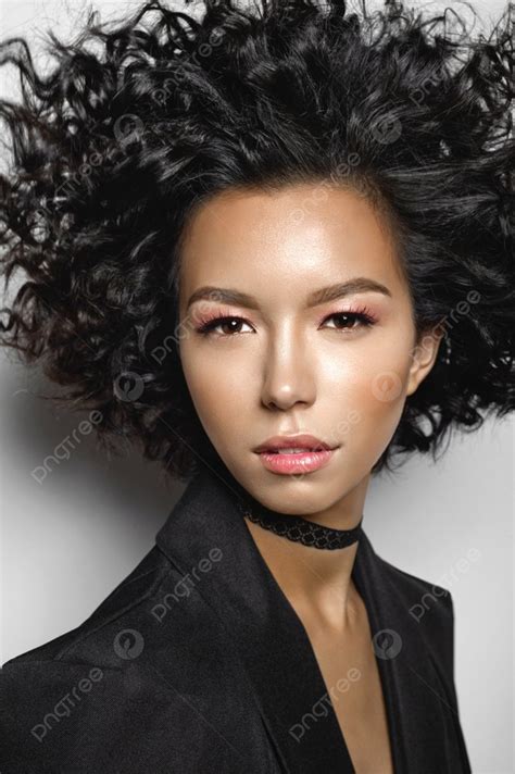 Fashion Studio Portrait Of Beautiful Mulatto Woman With Afro Curls