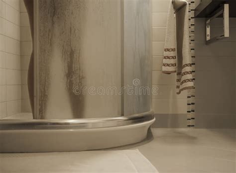 Naked Woman S Legs Entering The Foggy Glass Shower Cabin In Her Modern Design Bathroom Stock