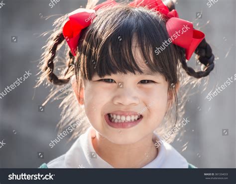 Happy Little Girl School Uniformhaving Fun Stock Photo 381334033 ...