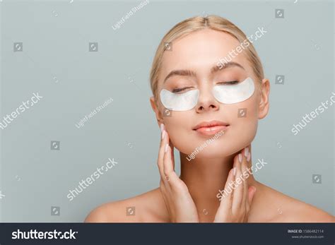 Naked Woman Eye Patches Touching Face Stock Photo Shutterstock