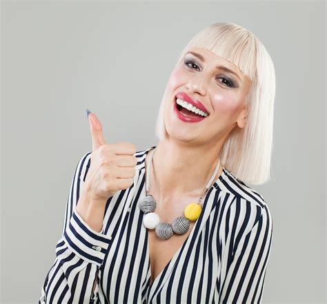 Premium Photo Happy Blonde Woman Showing Thumbs Up Fashion Model With Bob Haircut And Makeup