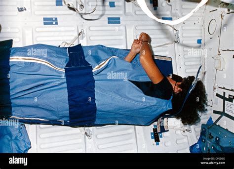 Astronaut Sleeping In Space Stock Photo - Alamy