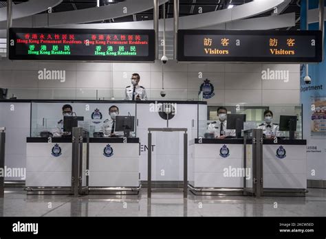 Officers From Hong Kongs Immigration Department Man An Immigration