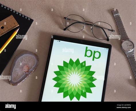 In this photo illustration BP plc logo seen displayed on a tablet Stock ...