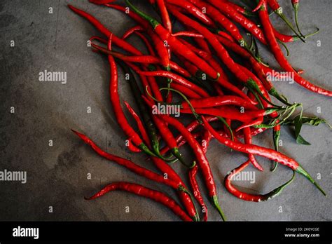 Long Red Hot Cayenne Pepper Om Dark Moody Setting Stock Photo Alamy