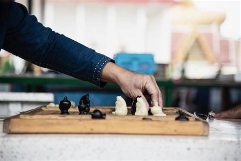 local thai people play  traditional thai chess  public area slow