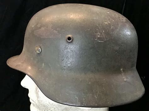 Unearth A Certified Original WWII German M35 Helmet With COA