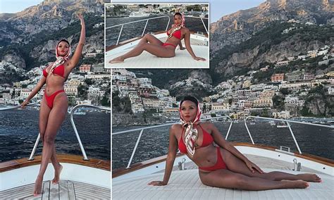 Janelle Monáe is scorching hot in red bikini while posing on a yacht during summer getaway to