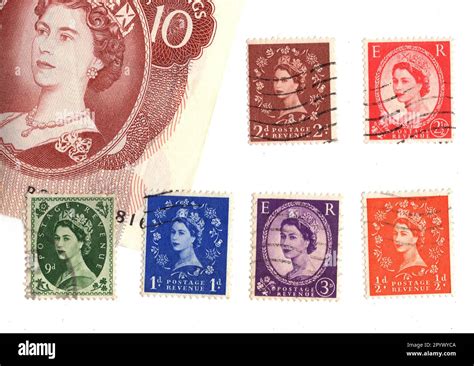 Vintage Postage Stamps And A Ten Shilling Note From The Reign Of Queen