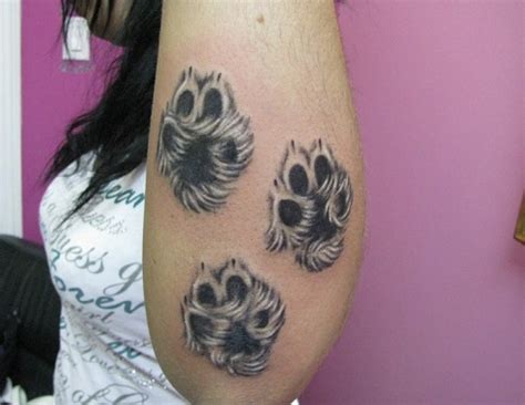 15 Coolest & Unusual Paw Print Tattoo Designs