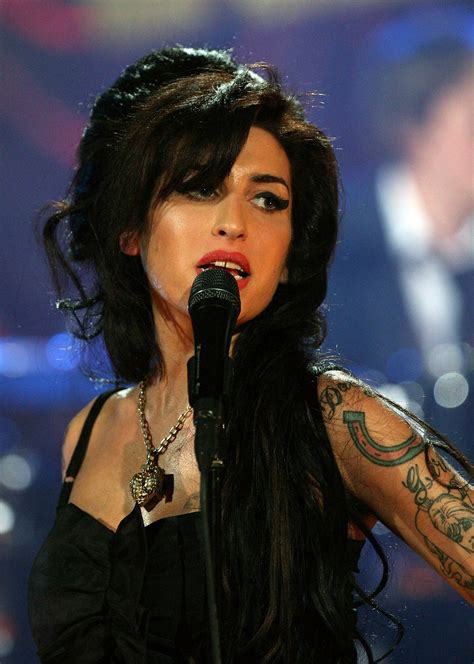 Amy Winehouses Beehive And Eyeliner Were As Big And Beautiful As Her