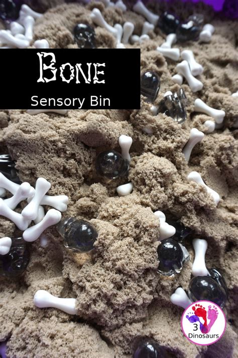 Bone Sensory Bin With Kinetic Sand For Halloween 3 Dinosaurs