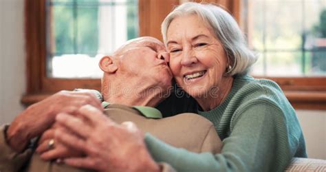 Face Of Senior Couple Kiss And Hug In Home For Love Care Or Together