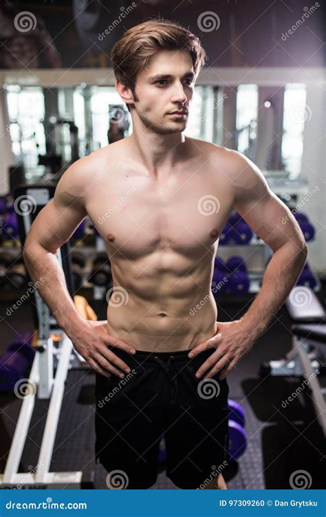 Muscular Man Working Out In Gym Doing Exercises At Triceps Strong Male Naked Torso Abs Fitness