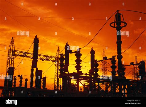 Electricity power lines in silhouette Stock Photo - Alamy