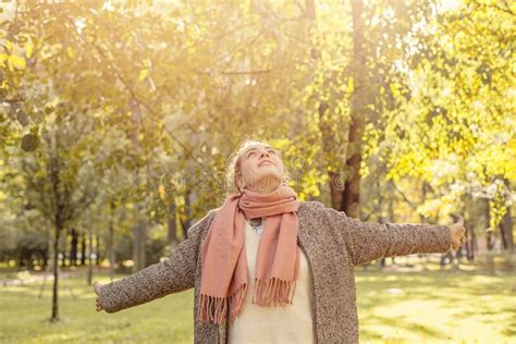 Beautiful Autumn Woman Holding Yellow Maple Leaf Outdoors Romantic