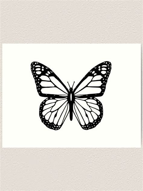 A Black And White Drawing Of A Butterfly