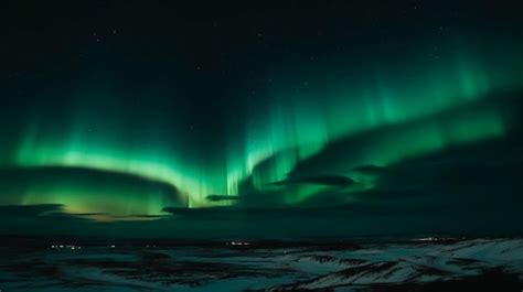 Premium AI Image | A green aurora borealis is lit up in the night sky.