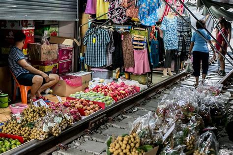 Private Tour Maeklong Railway Market And Damnoen Saduak Floating Market