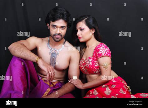 Romantic couple is traditional Indian attire Stock Photo - Alamy