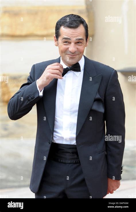 German actor Erol Sander arrives at the opening of the Bayreuth Festival 2011 in Bayreuth ...