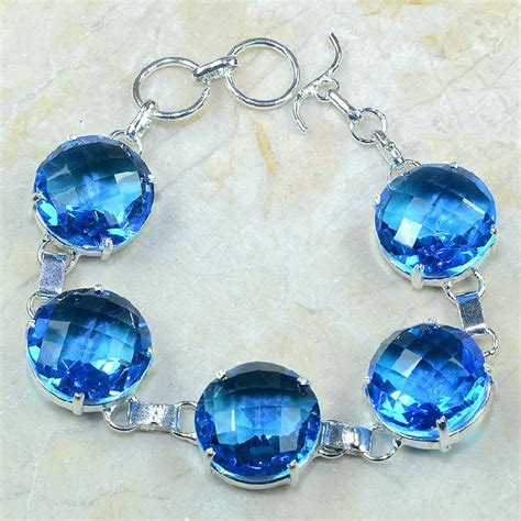 Achat Vente Bracelet En Topaze Bleue Suisse Bijoux Monture En Argent 925