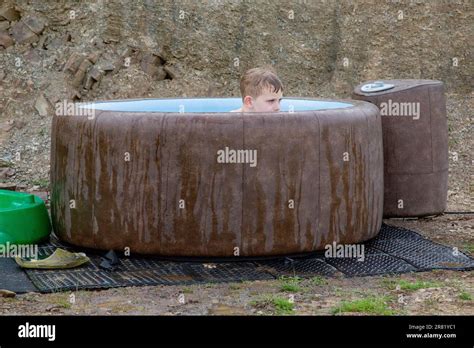 Six Year Old Boy In A Hot Tub High Bickington Devon England United Kingdom Stock Photo Alamy