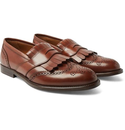 Brunello Cucinelli Brogue Detailed Leather Kiltie Loafers In Brown For