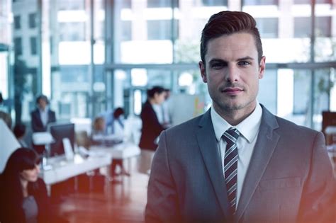 Premium Photo | Businessman standing in office