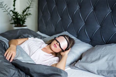 Good Morning Concept Beautiful Woman Sleeping In Bed With Mask On Her