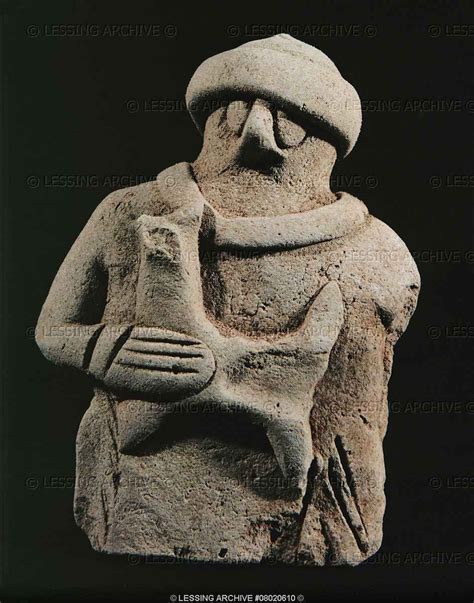 SUMER SCULPTURE 5TH-2ND MILL.BCE Shepherd carrying a lamb. Terracotta ...