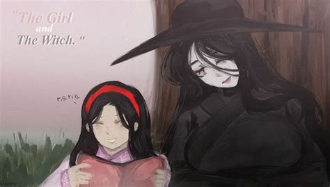 Two Girls Dressed In Black And Red Sitting Next To Each Other