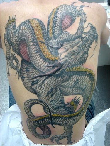 Large serpent dragon full back tattoo - Tattooimages.biz